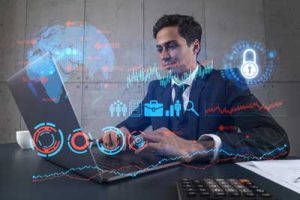 Businessperson securing data with cybersecurity services, represented by a holographic padlock over a laptop.