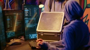 Hackers celebrate doing security breach A cybersecurity specialist performing white box security testing on a computer system